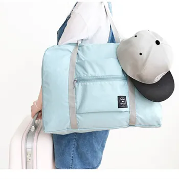 Grynos spalvos kelioninis krepšys gali nusimesti lagaminą ir pakuotės didelės rankinės